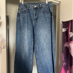 Size 32; never worn; adjustable in back